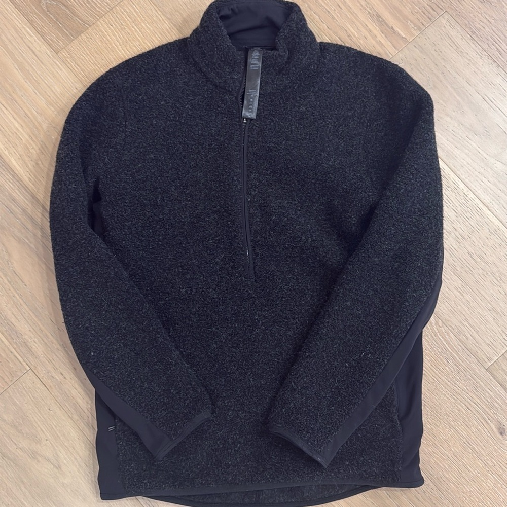 Lululemon At Ease half zip. In a wool blend material.